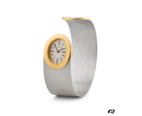 UTI cuff watch retailed by Faraone, 60s18k gold elliptical case, n.76110.Argenté dial with brushed finishing, painted indexes