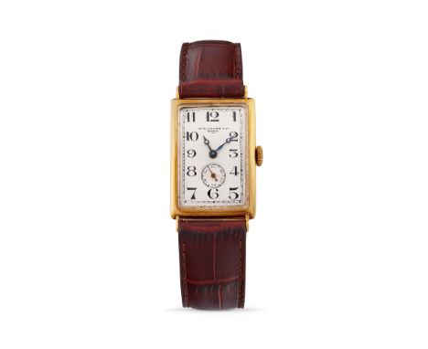 Patek Philippe Gondolo, 30s18k gold rectangular case, n.292382, hinged case back.Argenté dial, painted arabic numerals.Hand-w