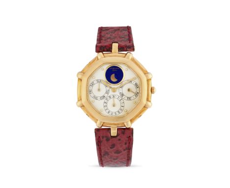 Gérald Genta Calendar G.2414, 80s18k gold octagonal stepped case, n.27232, Vendôme lugs.White dial with lapis lazuli disc aro