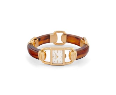 Jaeger-LeCoultre Etrier tortoise bracelet watch, 50s18k gold stirrup shaped case, n.1277198.Argenté dial, applied indexes.Han