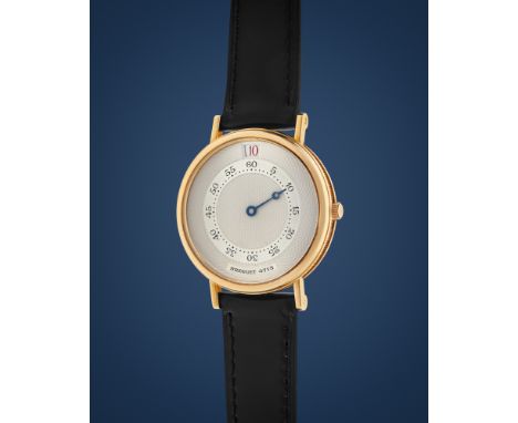 Breguet Jumping Hours Souscription 3370, 80s18k gold round case with fluted sides, n.4713 and 38/50.Cream coloured dial with 
