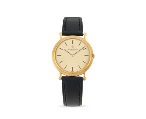 Vacheron Constantin Patrimony 39206, 80s18k gold extra-thin round case, n.571415, Officer lugs.Champagne dial, applied enamel