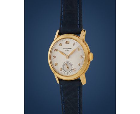 Patek Philippe Calatrava 2455, 50s18k gold round case with fluted sides, n.656960.Argenté dial, applied Breguet arabic numera