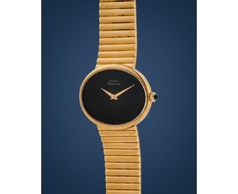 Piaget Ellipse 12502 onyx dial, 70s18k gold elliptical case, n.161273, onyx cabochon set crown.Onyx gemstone dial.Automatic m