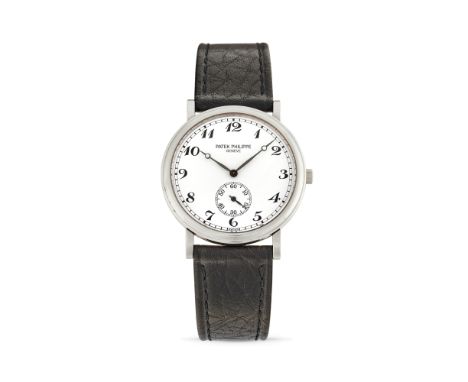 Patek Philippe Calatrava 5022G, 2000s18k white gold stepped round case, n.4053517.White enamel dial, painted Breguet arabic n