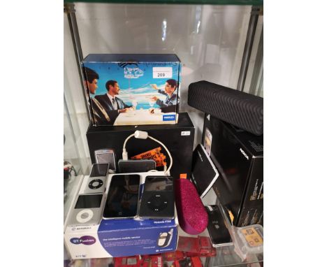 Shelf of mobile phones and I pods etc. 