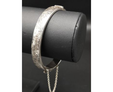 Vintage Silver hall marked birmingham Bangle engraved to front . 