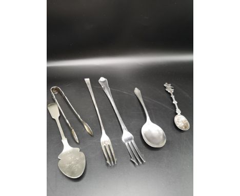 Lot of ornate cutlery to include large silver Hall marked sheffield fork, silver Hall marked spoon etc. 87 grams over silver 