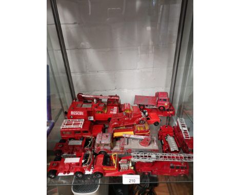 Shelf of playworn fire fighter s includes corgi. 