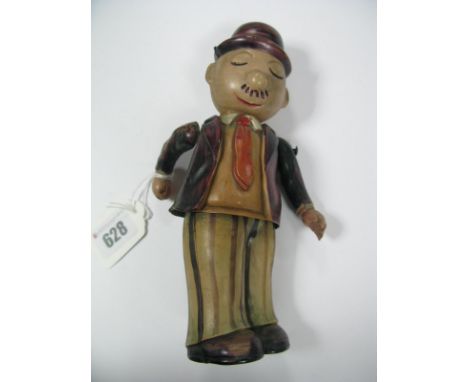 A Pre-War Japanese Celluloid Clockwork Character Figure, 'Wellington Wimpy' from Popeye, 18cm high, missing walking stick.