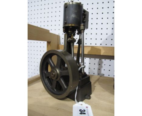 A Stuart Style Vertical Steam Engine, similar in patent to Stuart No. 1, however only 7½ inches tall and flywheel 3½ inches.
