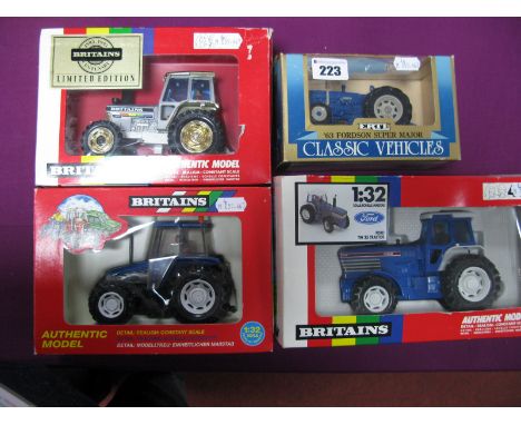 Four Boxed 1:32nd Scale Diecast Model Tractors, by Britains, ERTL comprising of Britains #5892 Centenary Tractor, Britains #9