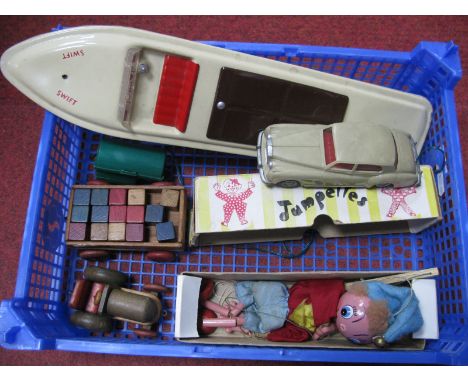 A Pelham Puppet 'Noddy', boxed, a tinplate 'Swift' Toy Boat, Hong Kong plastic Rolls Royce and two wooden toys, playworn.