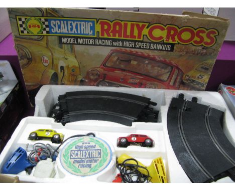 A 1970's Scalextric 'Rally Cross' Set, containing two rally Mini Cooper, playworn, boxed.