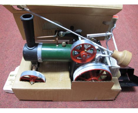 A Mamod TEIa Steam Tractor, model has been steamed, steering extension, funnel, firebox, burner, literature  present, a white