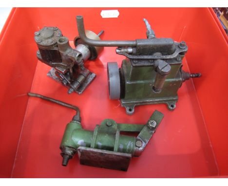 A Stuart or Similar Sirius Marine Engine, a water pump and a small vertical engine with flywheel.