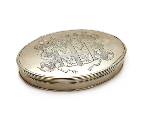 A George I silver snuff box,circa 1720, of elliptical form, the lid with a reeded border engraved with the crest of Corham, o