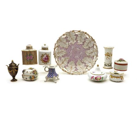 A collection of Continental porcelain,comprising a Dresden tea canister, with two painted reserves,13.2cm high, another Dresd