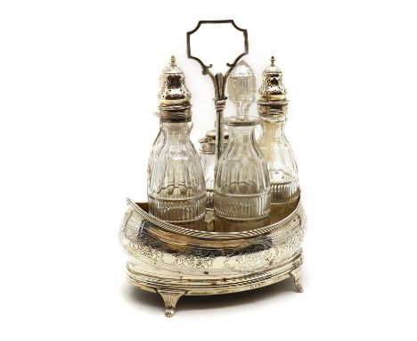 A George III silver five bottle cruet stand,possible Charles Fox I, London 1802, fitted with five cut glass unmarked silver-t