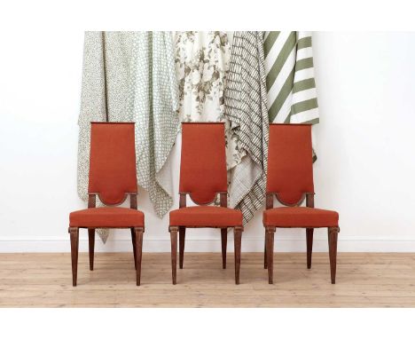 A set of six limed oak dining chairs,attributed to Pierre Lardin, c.1940, each with a tapering upholstered back, an overstuff