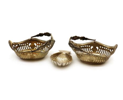 A pair of small silver baskets,probably by Henry Manton, Birmingham 1907, of oval form, with pierced sides and swing handles,