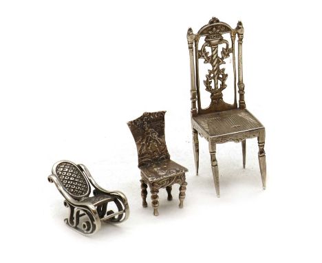 A group of three novelty silver chairs,late 19th to early 20th century, comprising; a continental example modelled as a regen