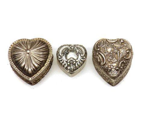 A group of three Victorian and later silver boxes,all heart-shaped, by Levi &amp; Salaman, Birmingham 1899, William Comyns &a