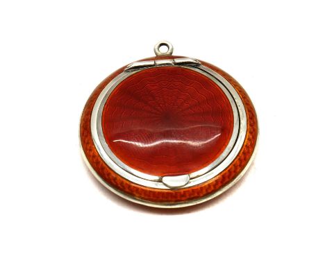 A small Norwegian enamelled silver compact,1920s, by Aksel Holmsen, of disc form, with orange guilloche enamel over a variety
