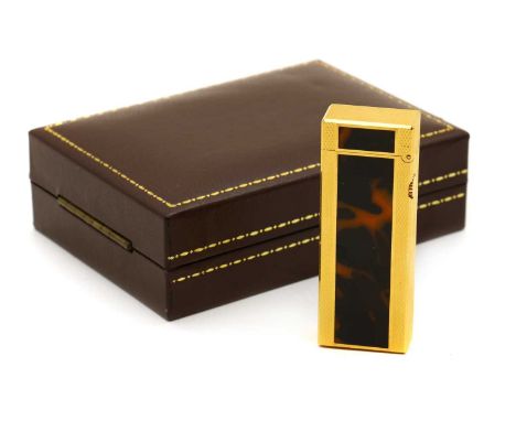 A cased Dunhill lighter, with faux tortoiseshell lacquered finish and engine turned decoration, marked Dunhill to the base in