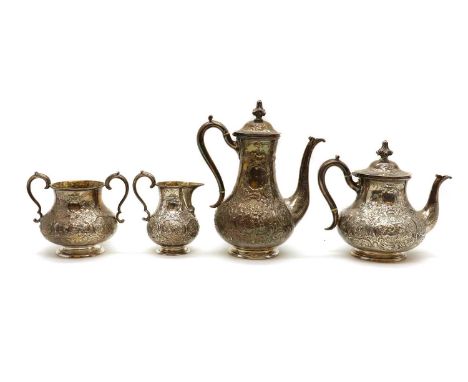 A four-piece Victorian silver tea and coffee service,by Robert Hennell III, London 1859, comprising a coffee pot, 28cm high, 