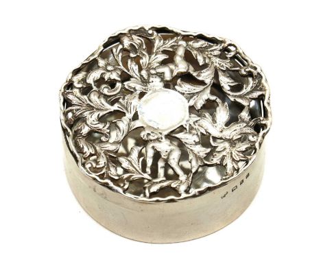 A silver potpourri table box,by Charles &amp; Richard Comyns, London 1919, of circular form, the lid with pierced foliate dec