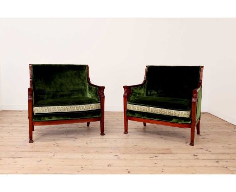 A pair of Egyptian Revival mahogany marquise chairs,19th century, French, the arms carved with sphinx head supports, the squa