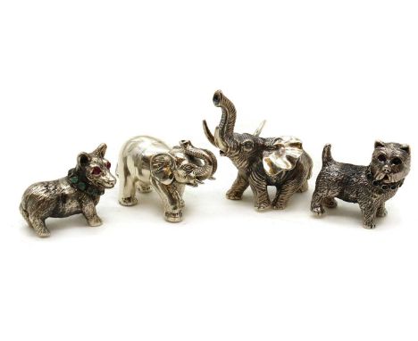 A collection of novelty silver figurines,20th century, likely continental, two modelled as elephants, one modelled as a corgi