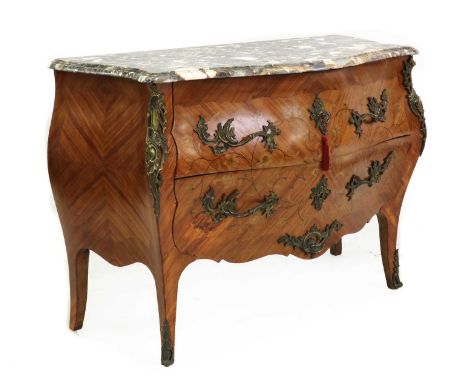 A Louis XV style commode,the serpentine marble top above two long drawers, with gilt metal foliate cast hands 115cm wide 51cm