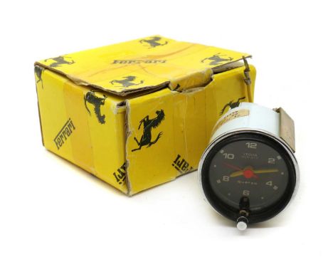 An Italian Veglia Borletti cockpit clock,1970s, for a Ferrari dashboard, of cylindrical form with a quartz movement, in a Fer