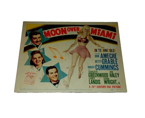 1941 - Moon Over Miami - Title Card - Vintage art from the period featuring the principal actors - Don Ameche and Betty Grabl