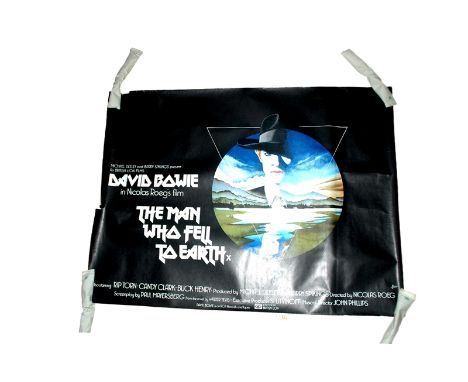 1976 - Man Who Fell to Earth - UK Quad -  Art by Vic Fair featuring David Bowie in the title roll   Condition: Rolled Good