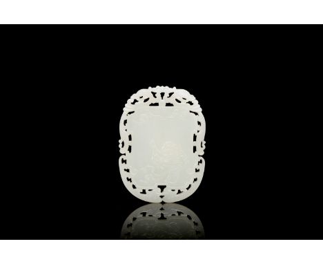 Full title: A Chinese reticulated white jade plaque, QingDescription:Dim.: 8 x 6 cm Provenance: A fine Belgian private collec