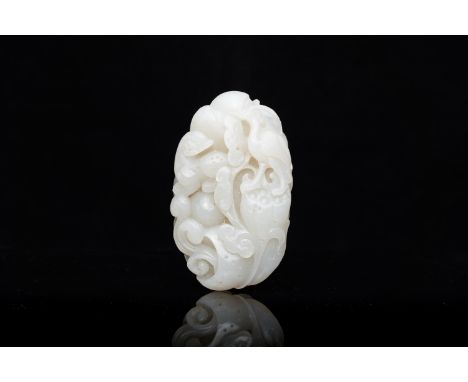 Full title: A Chinese white jade paper weight with a crane and a tiger, 17/18th C.Description:Dim.: 8,5 x 5 x 2 cm Provenance