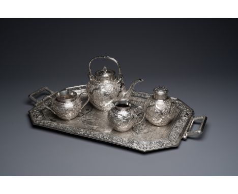 Full title: A Chinese silver 4-piece tea service on tray, Tu Mao Xing mark, 19th C.Description:Dim.: 67 x 38,5 x 4 cm (the tr