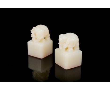 Full title: Two Chinese white jade 'elephant' seals of Wen Yuan Ge Bao 文渊阁寳 and Wen Hua Dian Bao 文華殿寶, QingDescription:Dim.: 