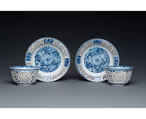 Full title: A pair of Chinese blue and white reticulated double-walled cups and saucers, KangxiDescription:Dia.: 13,5 cm (the