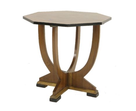 An Art Deco walnut hexagonal lamp table,with a fret cut 'X' shaped stand,60.5cm diameter57.5cm high