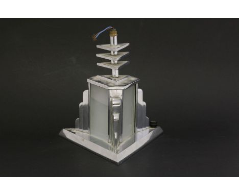 An Art Deco table lamp,of triangular form, with frosted glass panels, 21cm high, andanother table lamp,with a chrome shade an