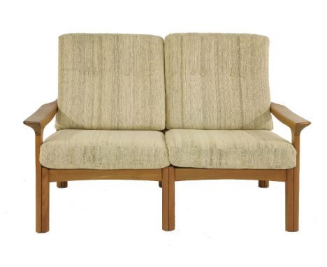 A two-seater teak and oatmeal upholstered sofa,designed by Juul Kristensen for Glostrup,138cm wide