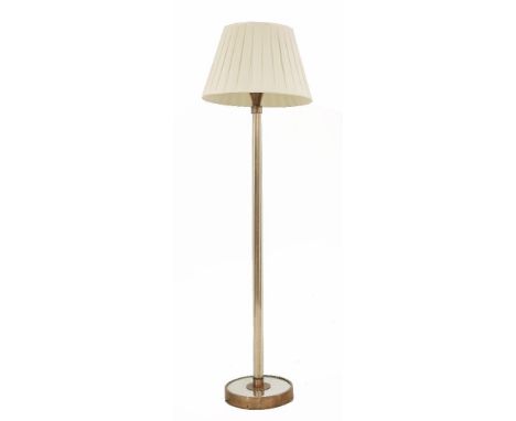 An Art Deco standard lamp, with multi-glass rod column, raised on a mirrored and copper loaded plinth, with a modern pleated 