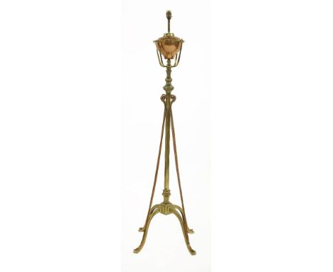 An Arts and Crafts copper and brass lamp standard,by WAS Benson, converted with a rise/fall central column,141cm high