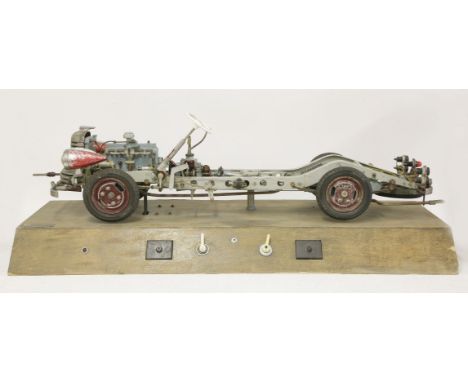An Hohm electric working demonstration model of a car,with a four-cylinder engine, working lights, number plate 'EH-54', labe