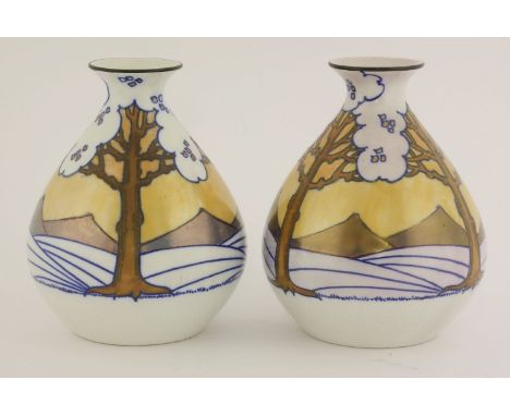 A pair of Burleighware pottery vases,designed by Charlotte Rhead, tube-lined with trees, orange and purple lustre panels,16.5