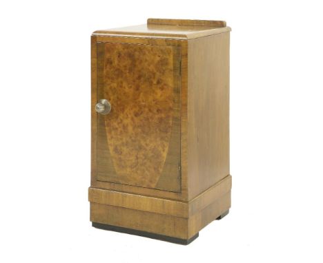 An Art Deco walnut pedestal cupboard,with a single shelf,38.5cm wide38.5cm deep75cm high